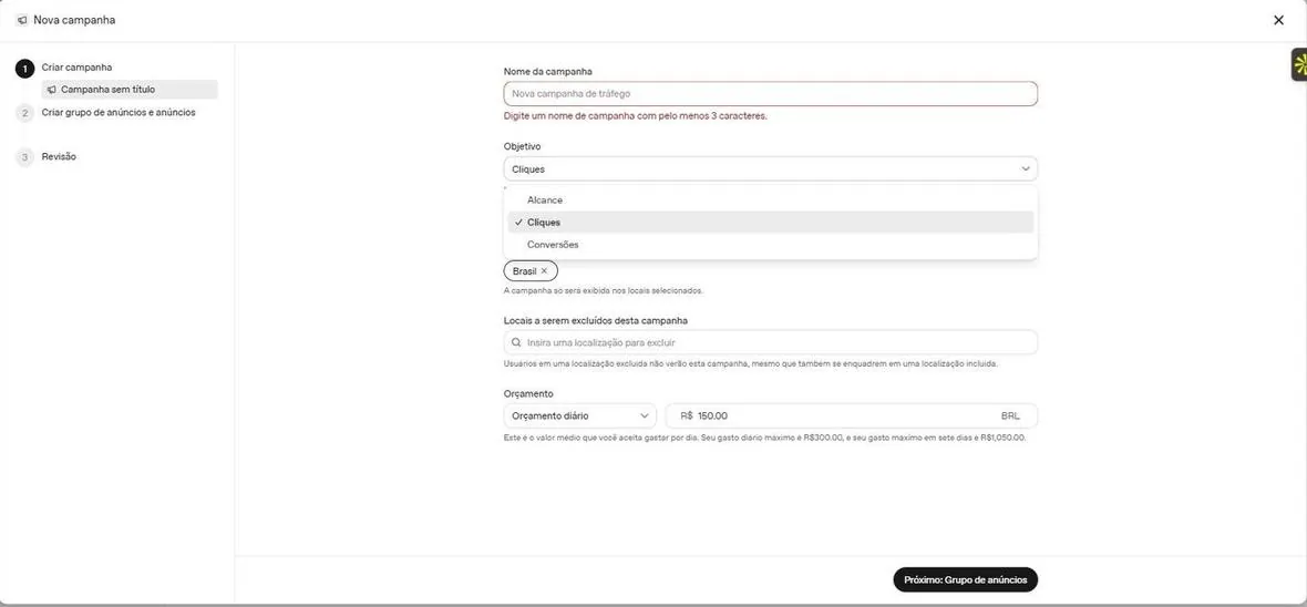 Tela de criação de campanha com o menu de objetivos aberto: Alcance, Cliques e Conversões